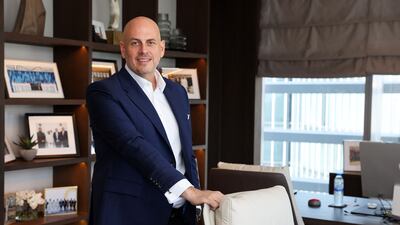 Sean McCauley, chief executive of Devmark, says his home in Dubai's Jumeirah Golf Estates is a cherished purchase. Pawan Singh / The National