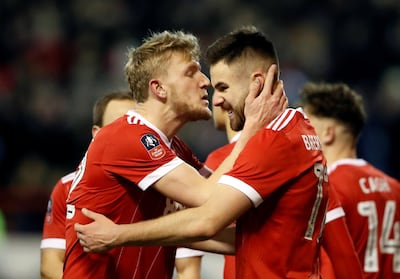 Nottingham Forest's Ben Brereton, right, celebrates scoring Forest's third goal against Arsenal. Carl Recine / Reuters