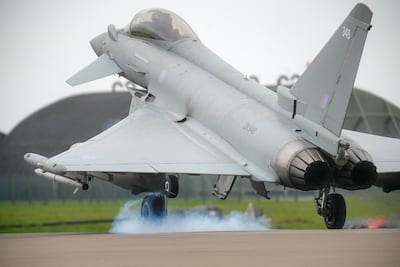 A Royal Air Force Eurofighter Typhoon jet takes off on a sortie from RAF Coningsby in England. Getty Images