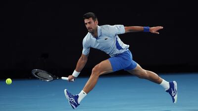 Novak Djokovic chases the ball during his match against Adrian Mannarino. Getty Images