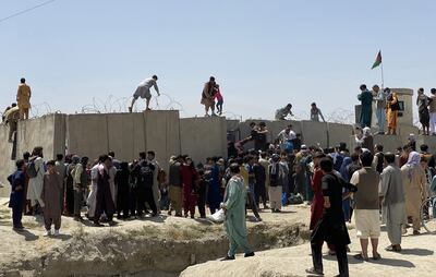 Aid agencies have promised to stay despite evacuations of troops and civilians from Kabul's airport, where chaos reigned on Monday. EPA