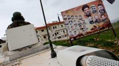 A UN soldier with Unifil patrols the border between Lebanon and Israel earlier this year.