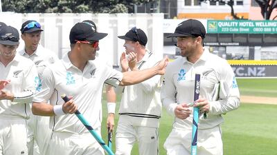 New Zealand's Neil Wagner, left, with teammate Tom Blundell walk from the field after New Zealand's win on Day 4 of the first Test against West Indies at the Basin Reserve in Wellington. Marty Melville / AFP