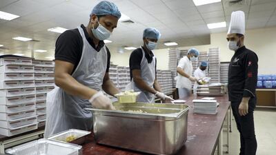 Staff start preparing the ingredients at 10am, with 15 to 20 people assigned to cooking the food, while another 35 pack the meals.