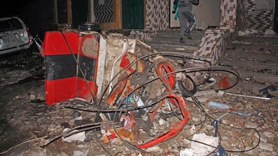 The remains of a rickshaw lie outside a Mogadishu restaurant bombed by Al Shabab extremists. AP