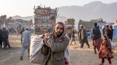 Afghan refugees settle in a camp near the Torkham Pakistan-Afghanistan border in Torkham, Afghanistan, on Saturday. AP