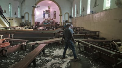 Damage caused by flooding inside a Catholic church in Xai-Xai, in the Gaza province of Mozambique. AFP