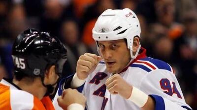 As if the game is already not physically tough, fights, such as this one between Philadelphia Flyers' Jody Shelley, left, and New York Rangers' Derek Boogaard, can cause even more traumatic head injuries. Boogaard died age 28 from an accidental drug and alcohol overdose while recovering from a concussion on May 13, 2011.