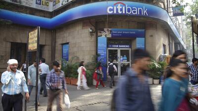 Pedestrians walk by a Citigroup bank branch in Mumbai, India. Kuni Takahashi / Bloomberg