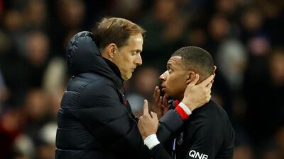 Kylian Mbappe speaks to PSG coach Thomas Tuchel. Reuters