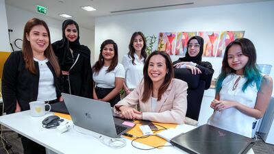 The all-women team of Place Communications, a PR agency in Abu Dhabi. Radwa Allabban (C) is the owner of the business. Victor Besa / The National