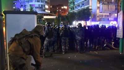 Lebanese soldiers and security clash with supporters of outgoing prime minister Saad Hariri during a protest in the Corniche al-Mazraa neighbourhood in the capital Beirut. AFP
