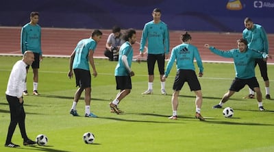 Real Madrid players take part in a training session ahead of their FIFA Club World Cup semi-final football match at the New York University Abu Dhabi stadium. Karim Sahib / AFP.