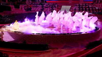In the pink with a splash of colour as the event starts with a bang. Photo: Reuters