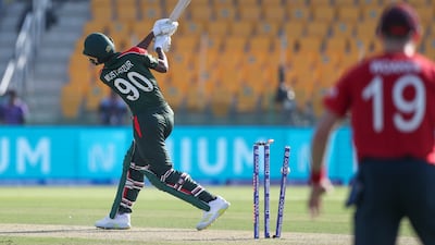 Bangladesh's Mustafizur Rahman is out bowled England's Tymal Mills. AP