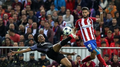 Real Madrid defender Danilo, left, vies with Atletico Madrid’s Yannick Ferreira Carrasco. Cesar Manso / AFP