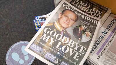 Copies of the 'Courier Mail' at a news stand in Brisbane, Australia, with news of Prince Philip's death. Getty Images