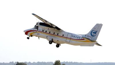 A Chinese made Harbin Y-12 performs at the Russian air show. Sergei Chirikov / EPA