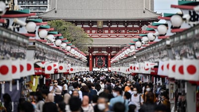 People visit Sensoji temple in Tokyo's Asakusa district. AFP