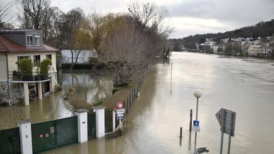 A house surrounded by floodwater from the Seine river in Bougival, west of Paris. Stephane De Sakutin / AFP