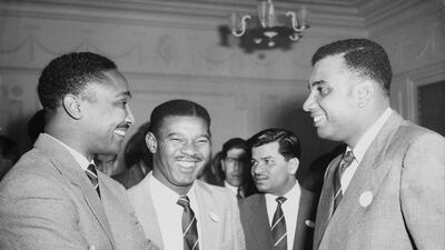 Left to right: Frank Worrell, Everton Weekes and Clyde Walcott - the three 'Ws' of the West Indian cricket team - at the West Indian Club, London, in 1957. Getty