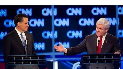 Newt Gingrich, right, reacted angrily in a presidential debate in Charleston, South Carolina on Thursday after the moderator questioned his marriage philosophy. His rival, the former Massachusetts governor Mitt Romney, left, has faced criticism for speaking French. Emmanuel Dunand / AFP