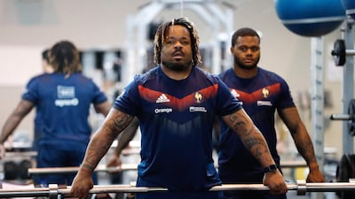 France rugby union national team centre Mathieu Bastareaud takes part in weight-lifting session. Patrick Kovarik / AFP