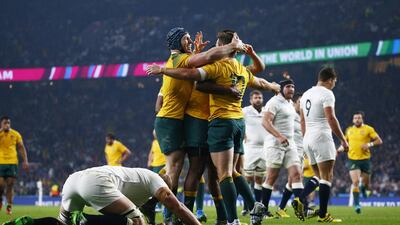 Australia's Bernard Foley celebrates scoring the second try against England at Twickenham. Andrew Winning / Reuters