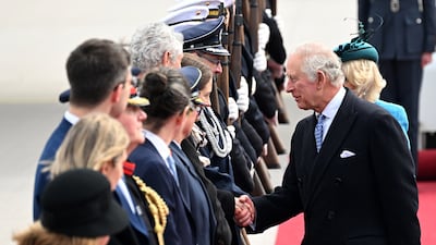 King Charles is greeted at the airport in Berlin. EPA