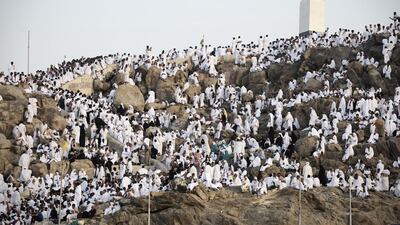 Haj pilgrims spend the second day of the pilgrimage on Mount Arafat by standing in prayer and supplication. Mohammed Al Shaikh / AFP