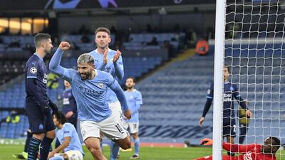 Aguero celebrates after he scores his team's second goal against Marseille at the Etihad Stadium. AFP