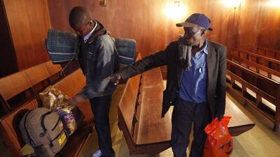 Two Zimbabweans seek shelter at the Central Methodist Church in Johannesburg.
