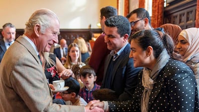 King Charles III meets refugee families to hear how the local council in Aberdeen has been supporting them. AFP