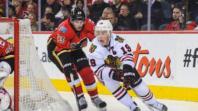 Jonathan Toews, right, leads the Chicago Blackhawks with 16 goals and 30 points. Derek Leung / AFP