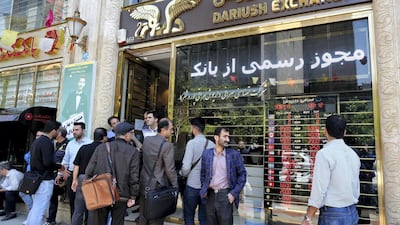 The value of the Iranian rial has lost almost half its value in the unofficial market since the start of the year, and is expected to continue depreciating for the rest of 2018. AFP/ ATTA KENARE
