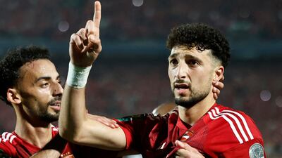 Al Ahly's Palestinian forward Wessam Abou Ali, right, celebrates scoring his team's second goal in the second leg of the CAF Champions League semi-final against TP Mazembe in Cairo. AFP