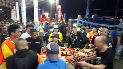 Thai rescue and paramedic personnel tend to the rescued passengers. AFP