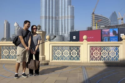 Permits will be 'mandatory for all individuals working in the digital advertising space'. Antonie Robertson / The National