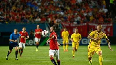 Juan Mata, left, of Manchester United battles with Martin Skrtel of Liverpool in the Guinness International Champions Cup 2014 Final at Sun Life Stadium on August 4, 2014 in Miami Gardens, Florida. Chris Trotman/Getty Images