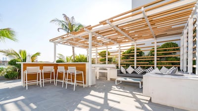 A bar area provides entertaining space