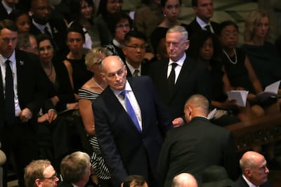 John Kelly, centre, and General James Mattis are both quoted in Bob Woodward's book despairing of president Trump's decision-making processes. Mark Wilson/Getty Images/AFP