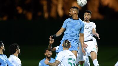Al-Ahli's player Ali Al-Asmari in action against Al-Batin's Zakaria Al-Sudani (up-front) during the Saudi Professional League soccer match between Al-Ahli and Al-Batin at King Abdullah Sport City Stadium, 30 kilometers north of Jeddah, Saudi Arabia. EPA