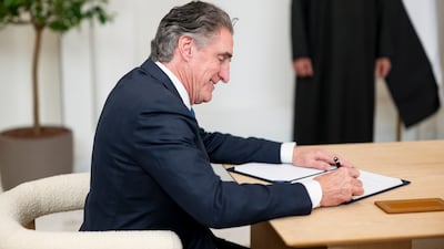 Mr Burgum signs a preliminary agreement between the UAE and the US to accelerate collaboration in energy and artificial intelligence, at Al Shati Palace.
