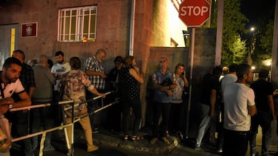 Armenia said shelling grew less intense during the day but accused Azerbaijani troops of trying to advance into its territory. AFP