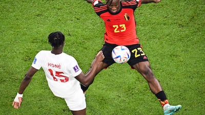 Belgium's forward #23 Michy Batshuayi and Canada's midfielder #15 Ismael Kone fight for the ball. AFP