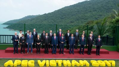 It was at the Apec summit that US president Donald Trump said to someone that Ms Ardern had "caused a lot of upset in her country". She replied: "no one marched when I was elected". Pictured: Apec leaders pose for a photo at the end of the summit in Danang, Vietnam, on November 11, 2017. Adrian Wyld / The Canadian Press via AP
