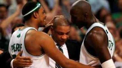 Doc Rivers is congratulated by his players after they beat their rivals the LA Lakers to clinch the title.