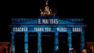 A projection reading "thank You" in Russian, English, French and German is projected on Berlin's Brandenburg Gate on the 75th anniversary of the end of World War Two. AFP
