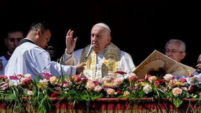 Pope Francis bestows the plenary 'Urbi et Orbi' blessing from the St Peter's Basilica at The Vatican at the end of the Easter Sunday mass. AP Photo