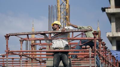 Syrian workers on a construction site in Beirut, Lebanon. A new edict now says that the only acceptable work for Syrians was in 'agriculture, cleaning and construction'. Bilal Hussein / AP Photo